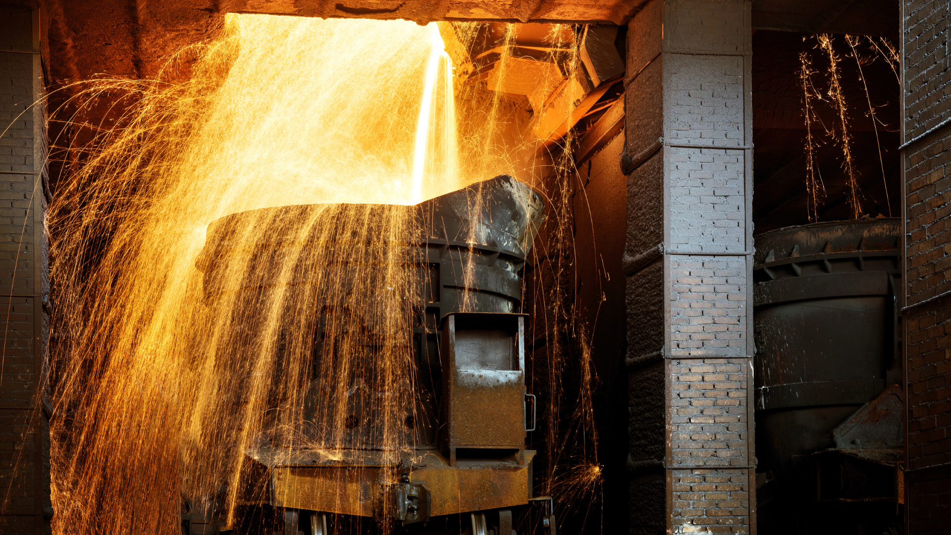 Man Using Measuring Tape in Factory Setting